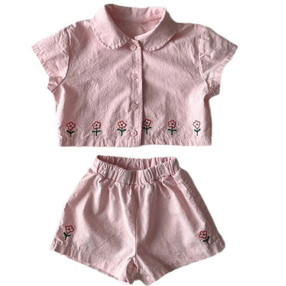 Children's floral shorts set in pink with short sleeves and matching shorts