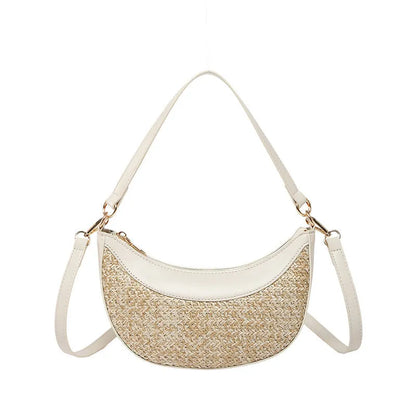 Women's hard-shell straw shoulder bag in a dumpling shape with a crossbody strap, shown in a choice of colours.
