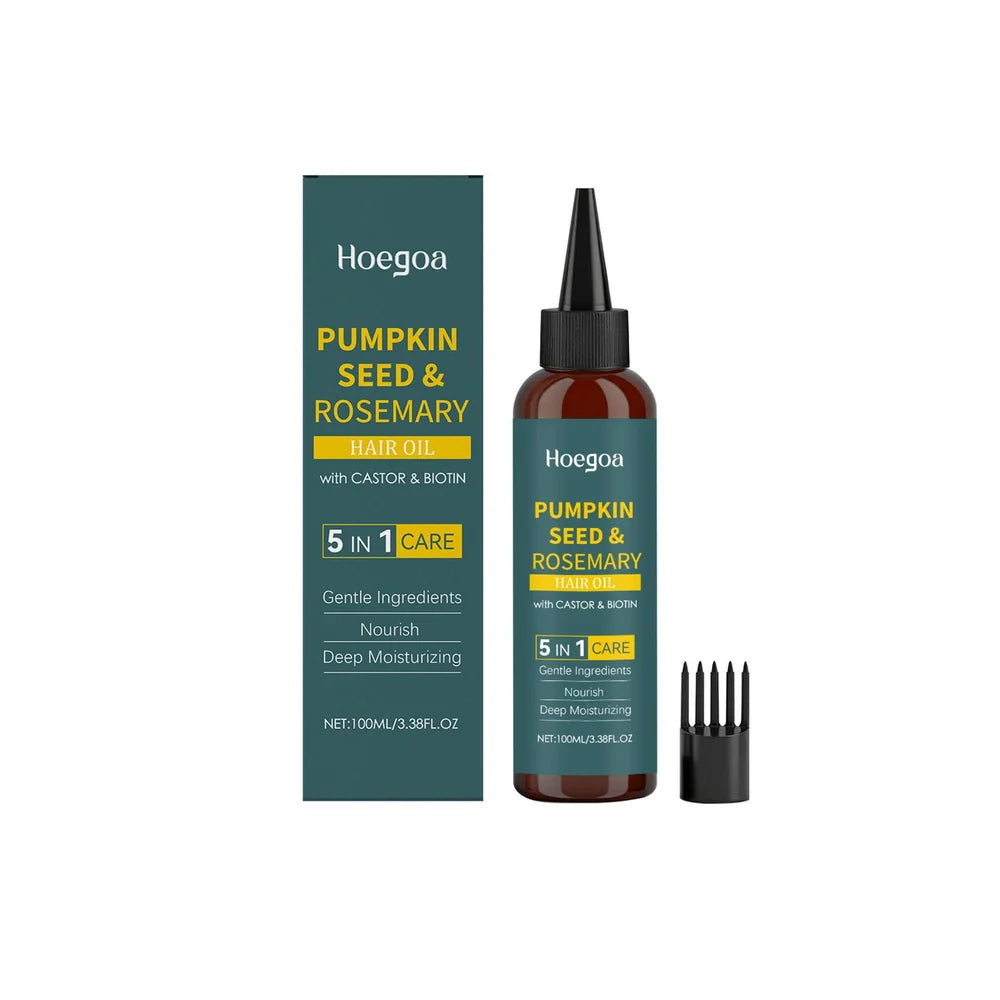 Rosemary essential oil bottle with pointed applicator and detangling comb for hair treatment