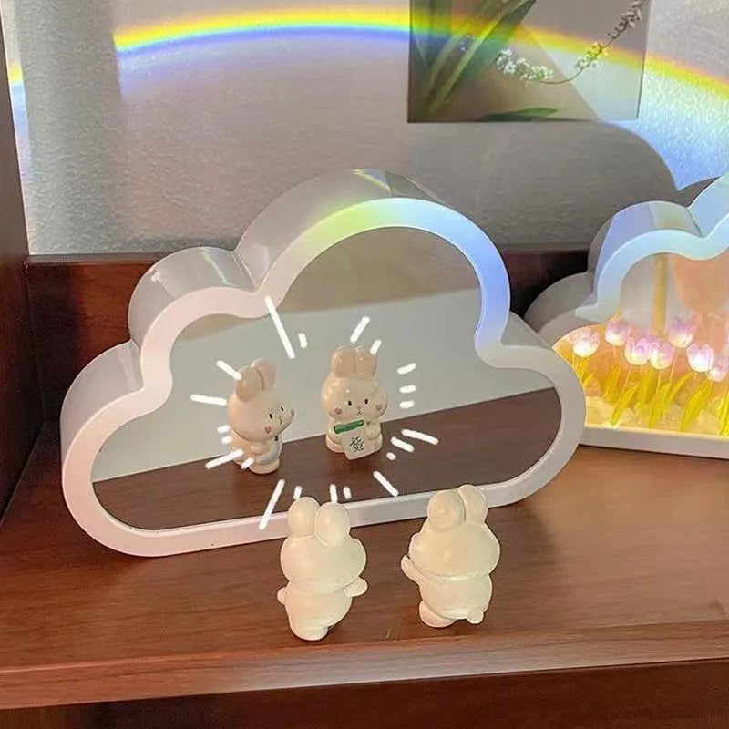 DIY tulip-shaped night lamp kit with LED lights and mirror surface in assorted colours on a desk.