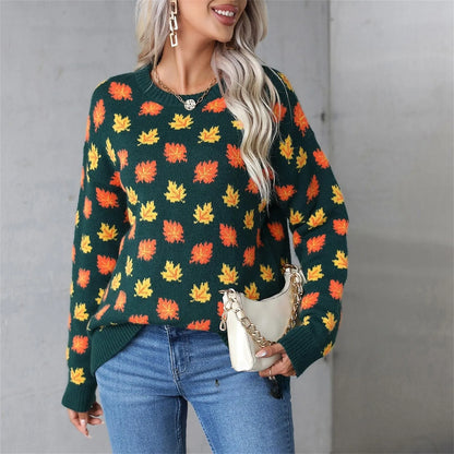 Beige and dark green Christmas sweater with maple leaf design, round neck, and loose fit