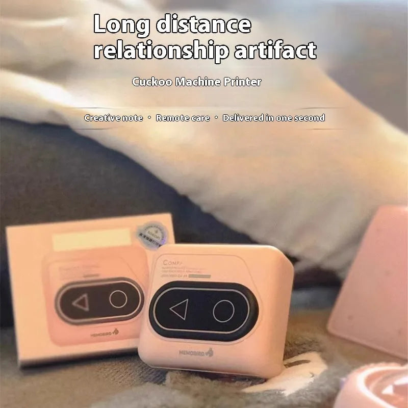 Compact Avocado Green mini Bluetooth thermal printer with mobile phone, thermal paper roll, and charging cable.