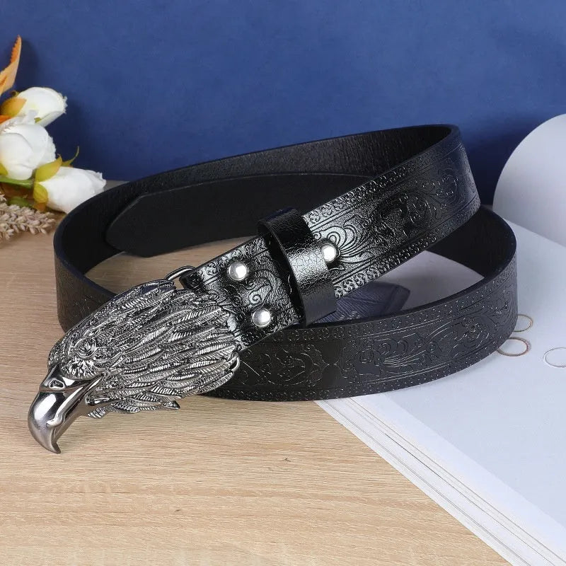 Men's brown imitation leather belt with an embossed alloy cow head pin buckle fastened on trousers.