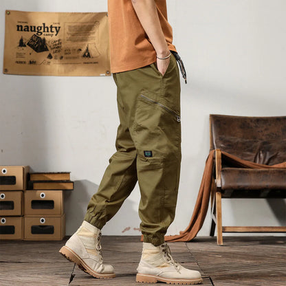 Men's tapered ankle harem trousers in cotton fabric with mid-waist fit