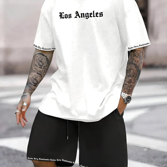 Man wearing a printed short-sleeve top and matching shorts from the sports style two-piece set.