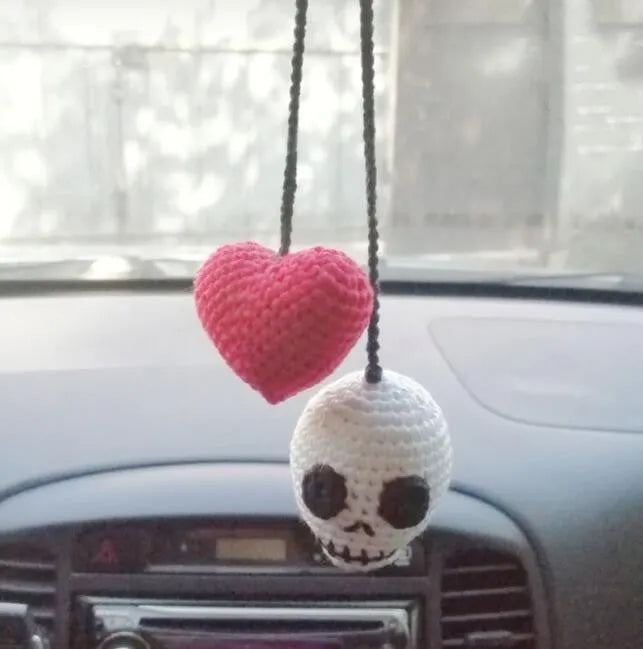 Soft, hand-woven plush car hanging ornament in a cartoon character design.