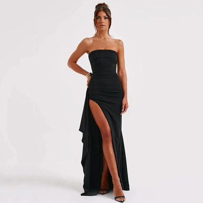 Backless pleated maxi dress in various colors, featuring high-waisted silhouette and unique design