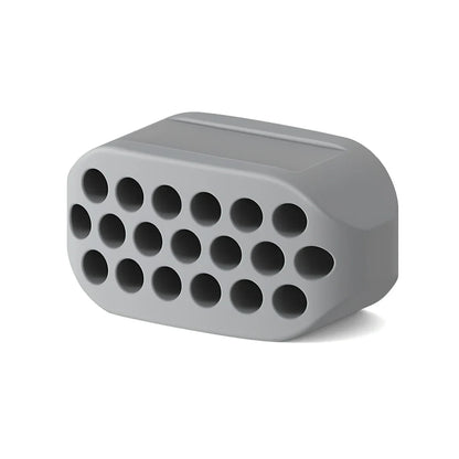 Compact black silicone jaw trainer for muscle shaping, food-grade material, portable at 5cm size for daily facial exercises