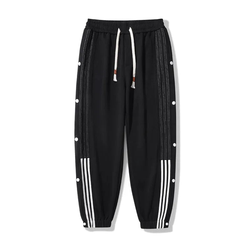 Men's loose fit ankle-tied sweatpants in a cotton blend fabric on a neutral background