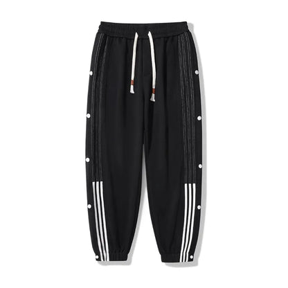 Men's loose fit ankle-tied sweatpants in a cotton blend fabric on a neutral background