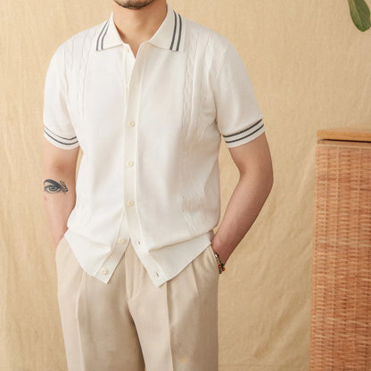 Casual apricot coloured lapel collar polo shirt made from thin cotton blend fabric on a hanger.