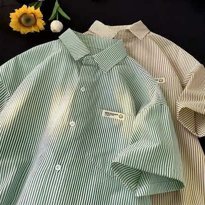 Blue striped loose-fit plus size shirt with half sleeves on hanger