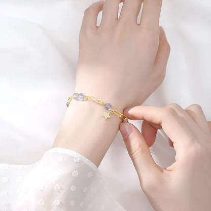 Women's mobius loop bracelet made with natural grey moonstone, strawberry quartz, or citrine crystal beads in a constellation design.