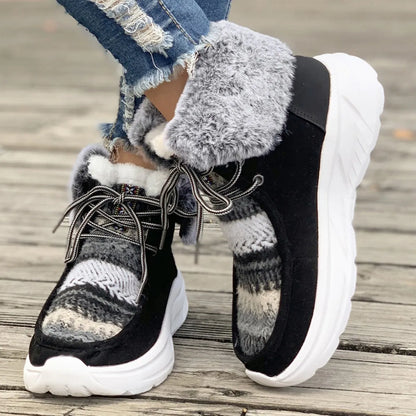 Women's lace-up snow boots in beige with suede upper, thermal fur lining, and non-slip rubber sole on a winter background