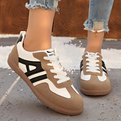 Women's retro lace-up jogging shoes in black, grey, or khaki with a platform sole.