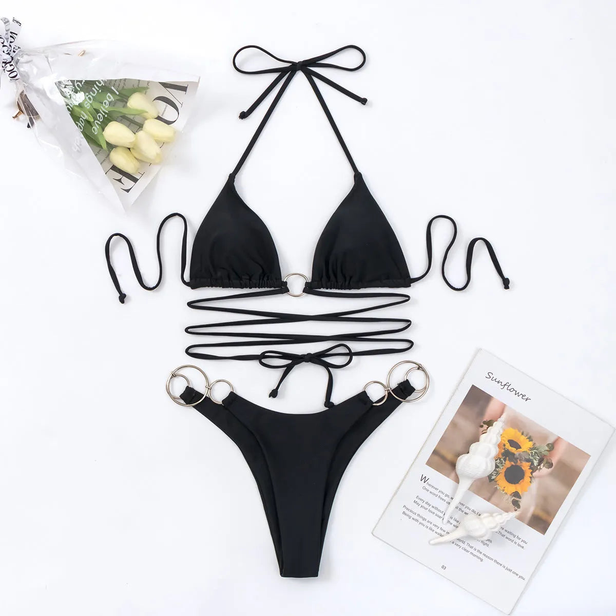 Black women's bikini swimsuit with metal ring straps on long backless design