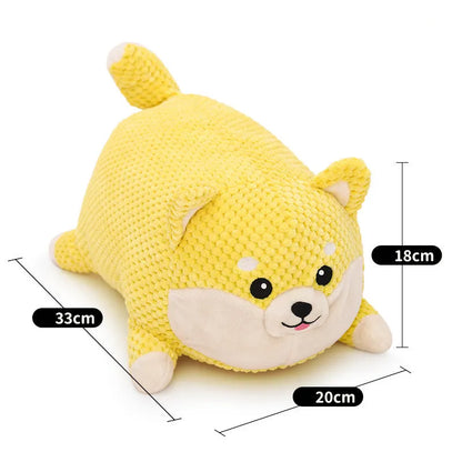 Calming plush dog toy with teeth cleaning chew surface and squeaker