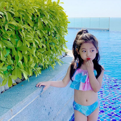 Children's swimsuit set with bikini top and fish tail skirt in pink colours