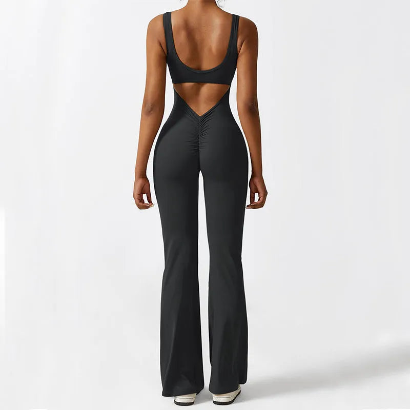 Women's sleeveless flare jumpsuit for yoga in high elasticity polyester fabric.