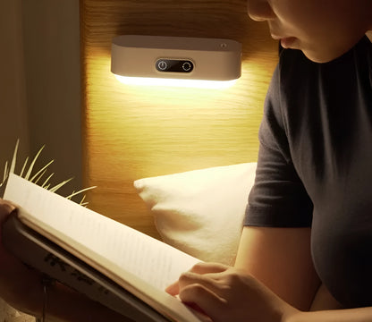 White magnetic mount USB rechargeable LED night light with motion sensor and touch control panel.