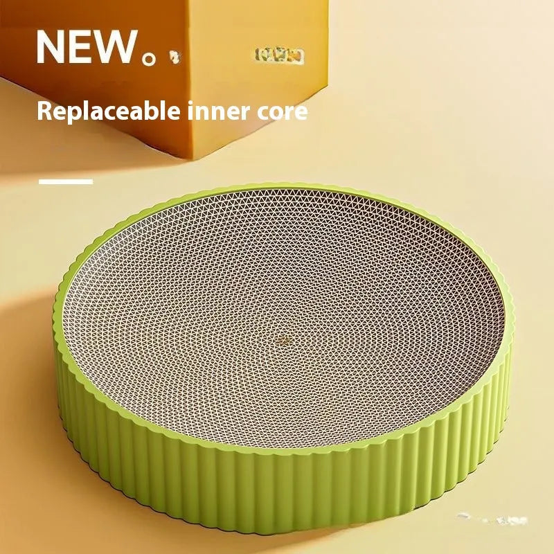 Round green cat scratching board measuring 55cm with corrugated paper surface and two replacement refills