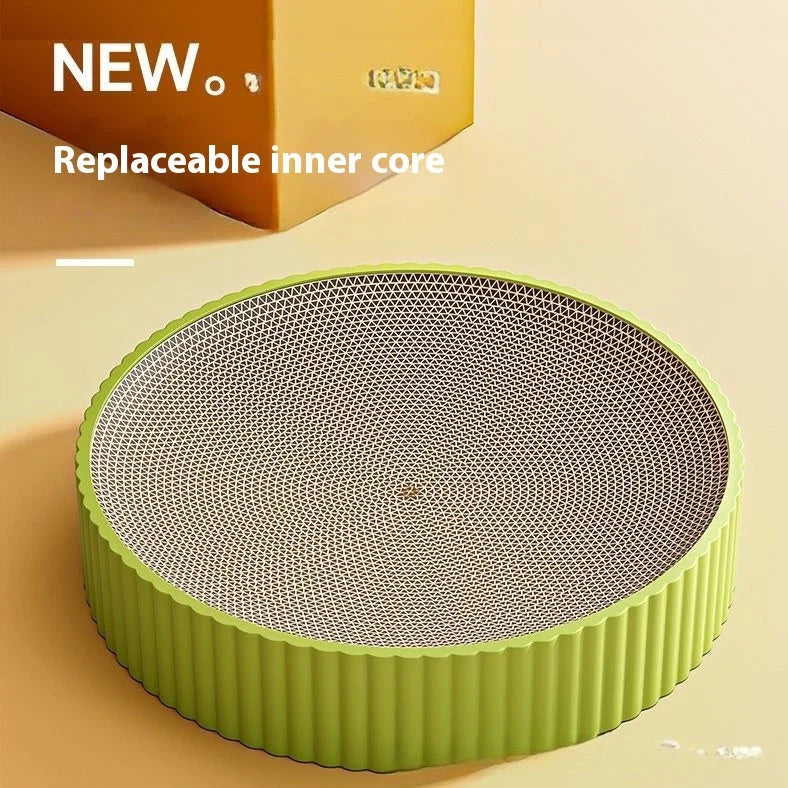 Green round cat scratching board measuring 55cm with corrugated paper surface and two replacement inserts