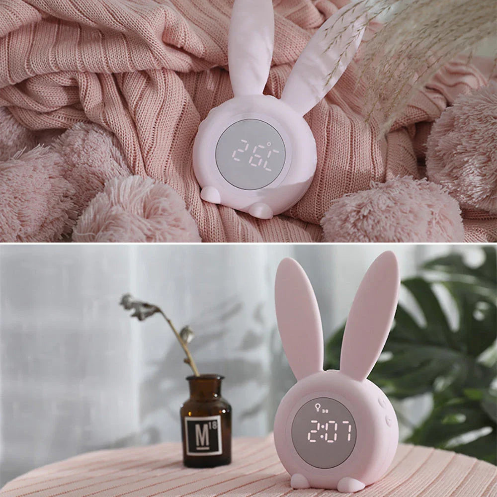 Adorable bunny-eared LED alarm clock with sound control, available in blue, green, and pink colors