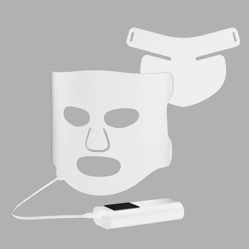 Black and white LED phototherapy face mask with controller showing seven colour light therapy options