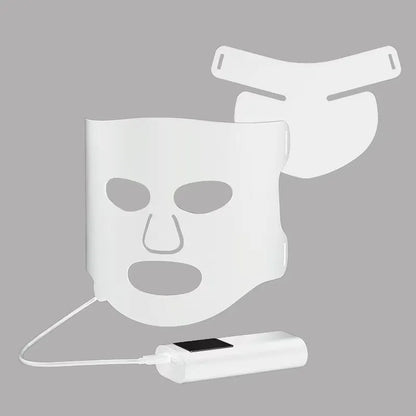 Black and white LED phototherapy face mask with controller showing seven colour light therapy options