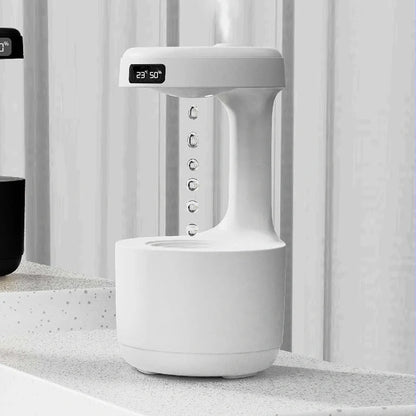 Anti-gravity humidifier with backflow water effects, ambient lighting, and sleek columnar design