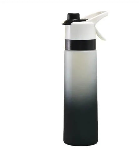 Large plastic spray water bottle with handle strap and leakproof lid in green colour.