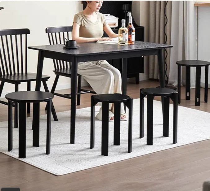 Stackable iron dining stool with round seat in modern design, showing graphic customisation option