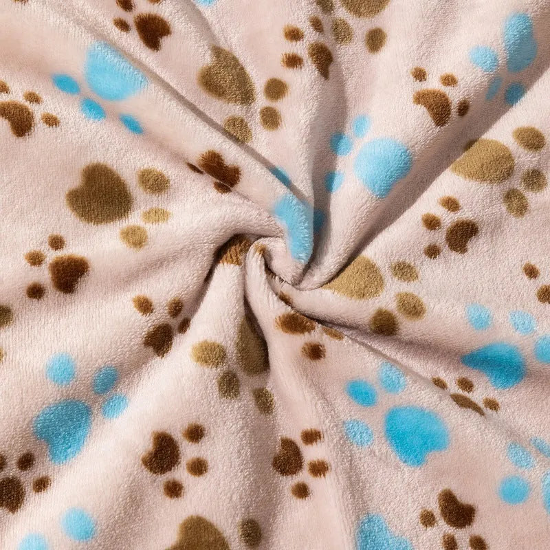 Blue dog cartoon print double-sided flannel pet blanket shown in a dog crate.