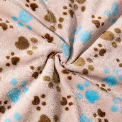 Blue dog cartoon print double-sided flannel pet blanket shown in a dog crate.