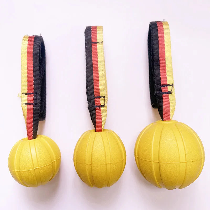 Camouflage and yellow EVA foam floating dog ball with knotted tetherball design.