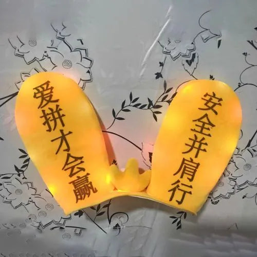 Rabbit ear ski helmet ornament with LED lighting and Velcro base attachment for helmet customisation