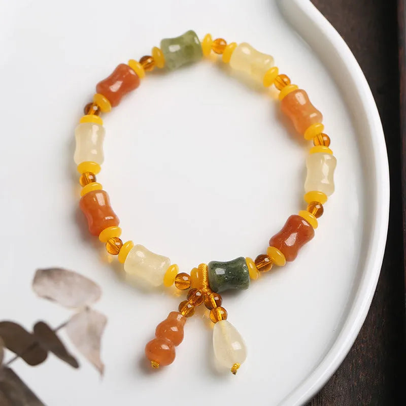 Natural Jinsi Jade small bone beads bracelet with geometric shape and Chinese auspicious patterns