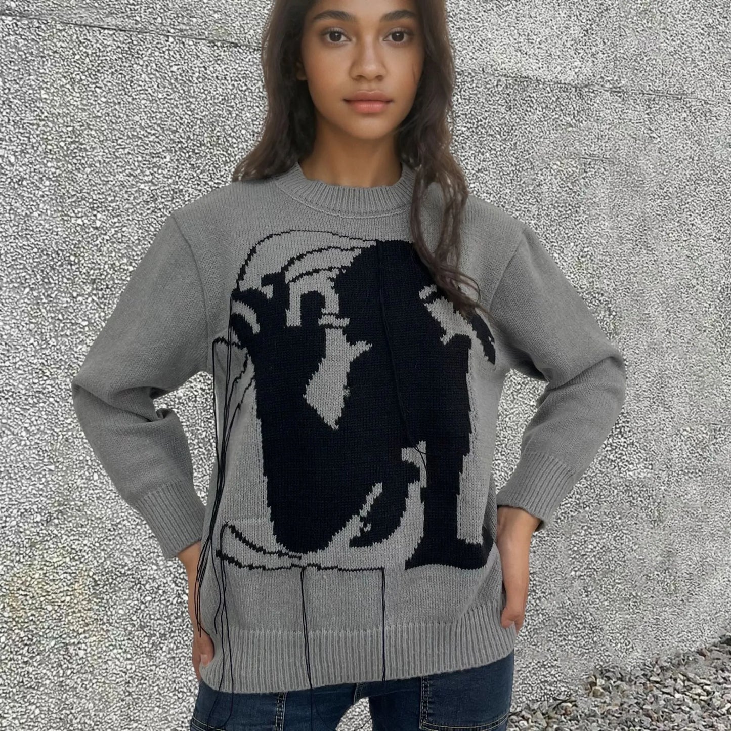 Women's grey alpaca wool sweater with abstract pattern and tassel design on regular sleeves