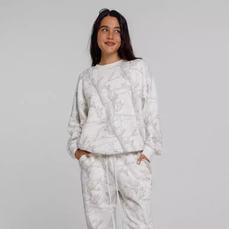 Camouflage and maple leaf print two-piece set for women featuring a hoodie and sweatpants in a variety of sizes