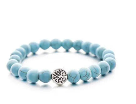 Handcrafted natural stone bracelet with alloy volcano white turquoise charm in a simple design.