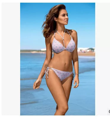 Women's push-up bikini set with leopard print design, available in sizes S to XL