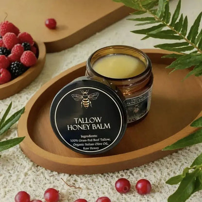 Glass jar of Honey Butter Moisturising Facial Cream with 57g net content label, shown with cream texture.