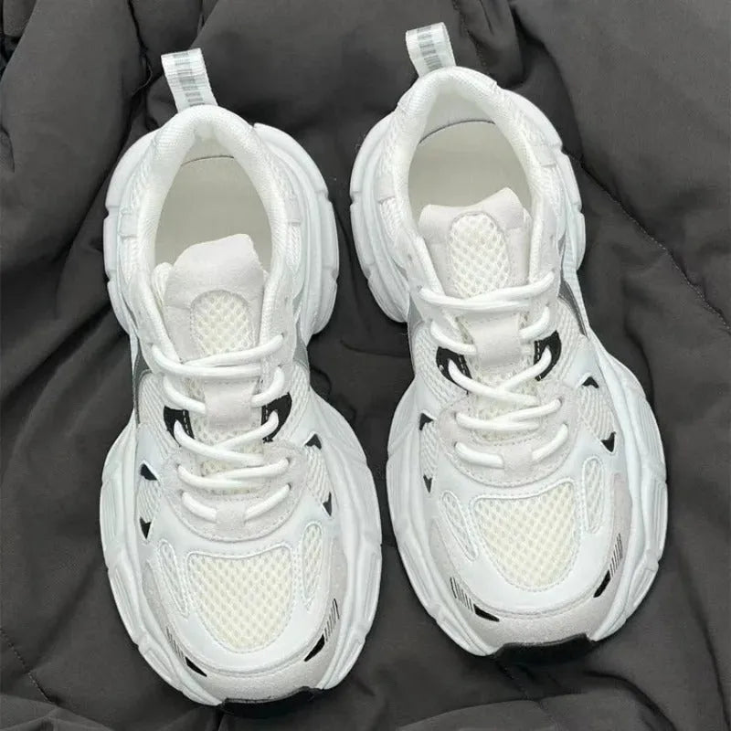 Beige Polar Wave mesh platform trainers with a wedge heel and lace-up front.