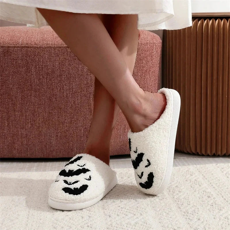 Halloween bat design plush slippers for indoor wear, available in white and black