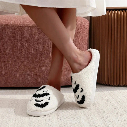 Halloween bat design plush slippers for indoor wear, available in white and black