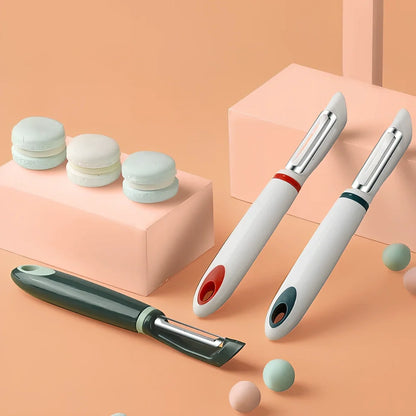 Stainless steel vegetable peeler with PP handle in aquamarine colour showing blade and grater functions