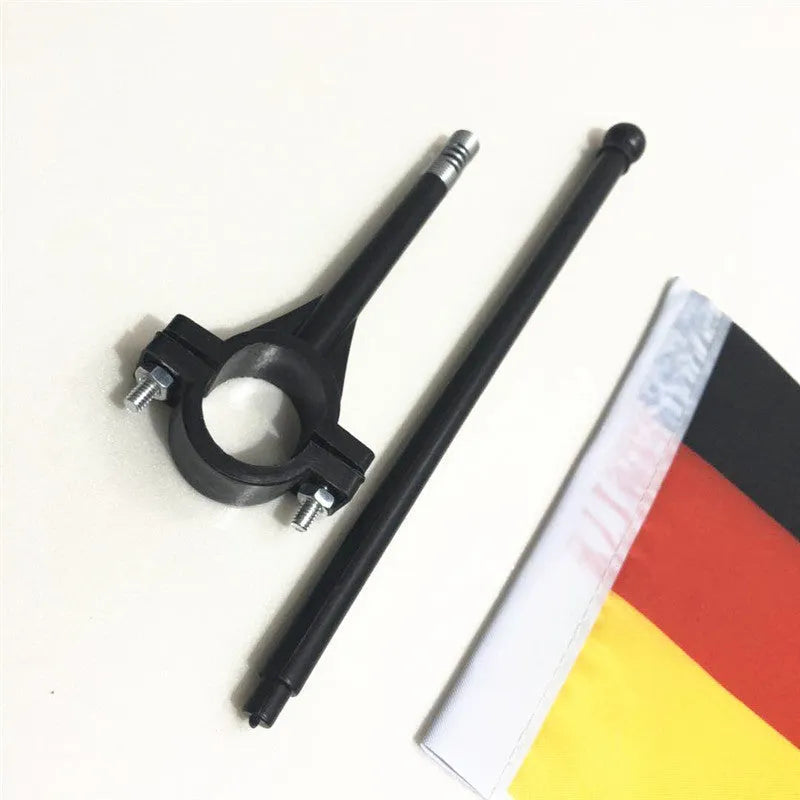 Square polyester flag measuring 30cm by 45cm on plastic handlebar pole for bicycle mounting