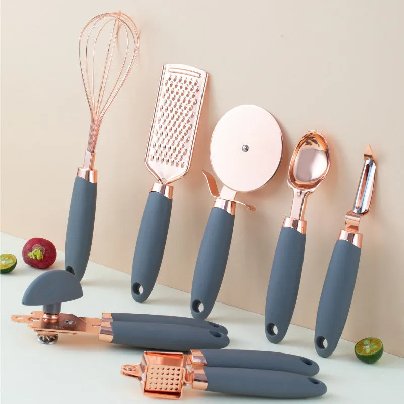 Rose gold stainless steel kitchen tool set with copper accents including peeler and utensils in six colour options