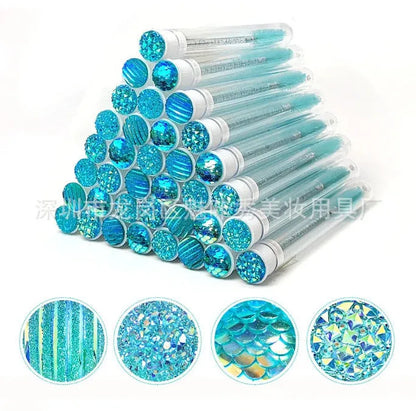 Disposable eyelash brushes in plastic storage tubes with spiral brush heads in four colours