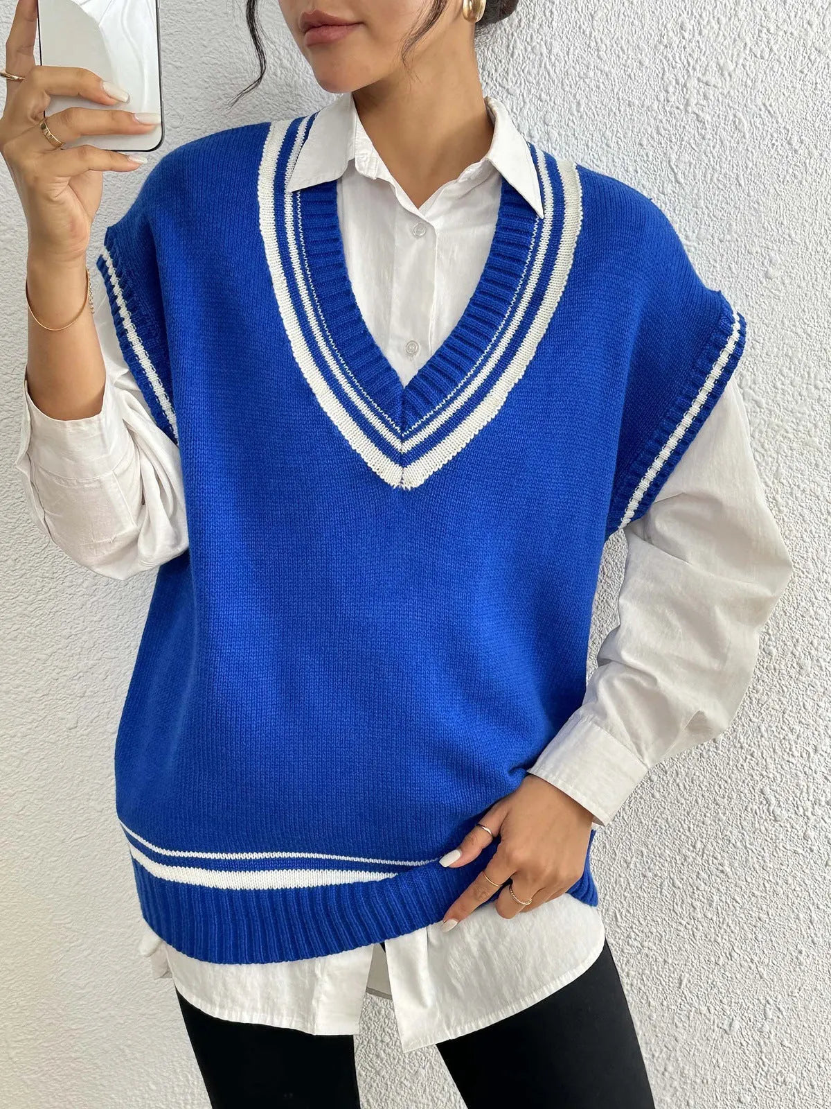 Women's college style acrylic pullover vest sweater in black, blue, and coffee colours with loose free size fit